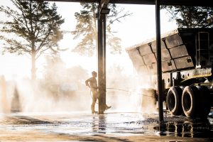 Man washing truck