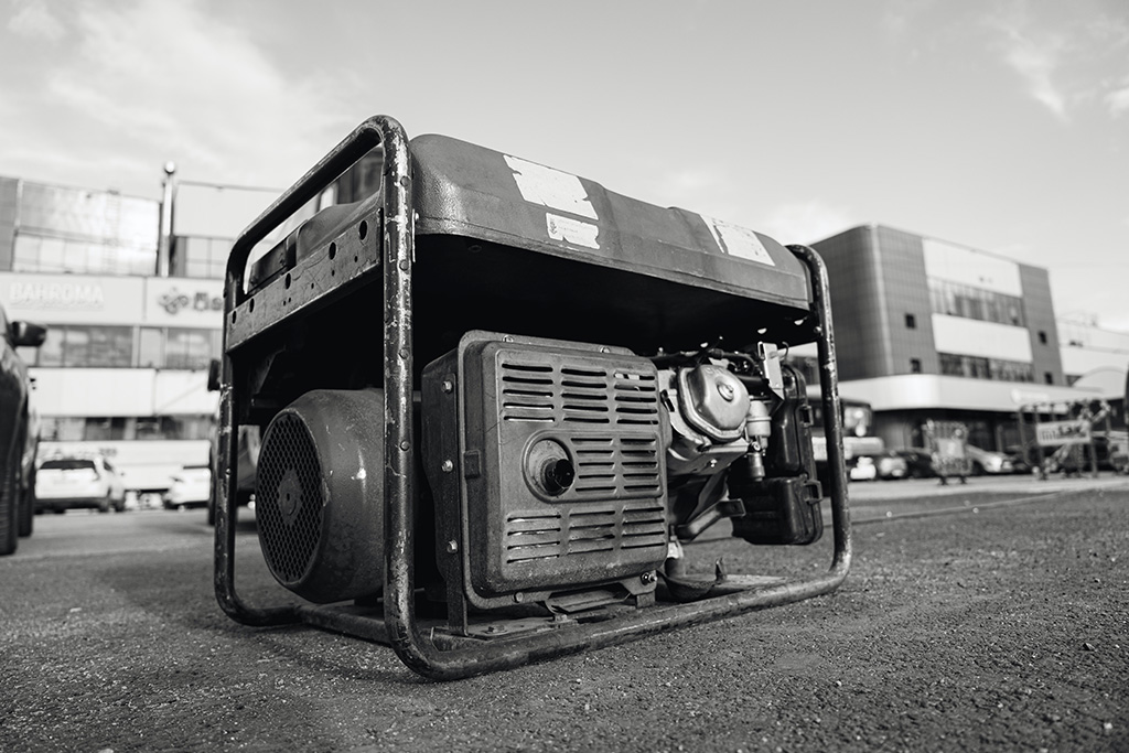 Power generator in an open retail parking lot