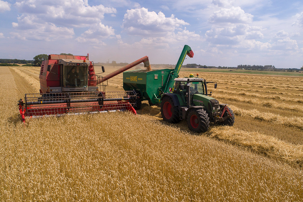 Agricultural machinery operating in a crop field